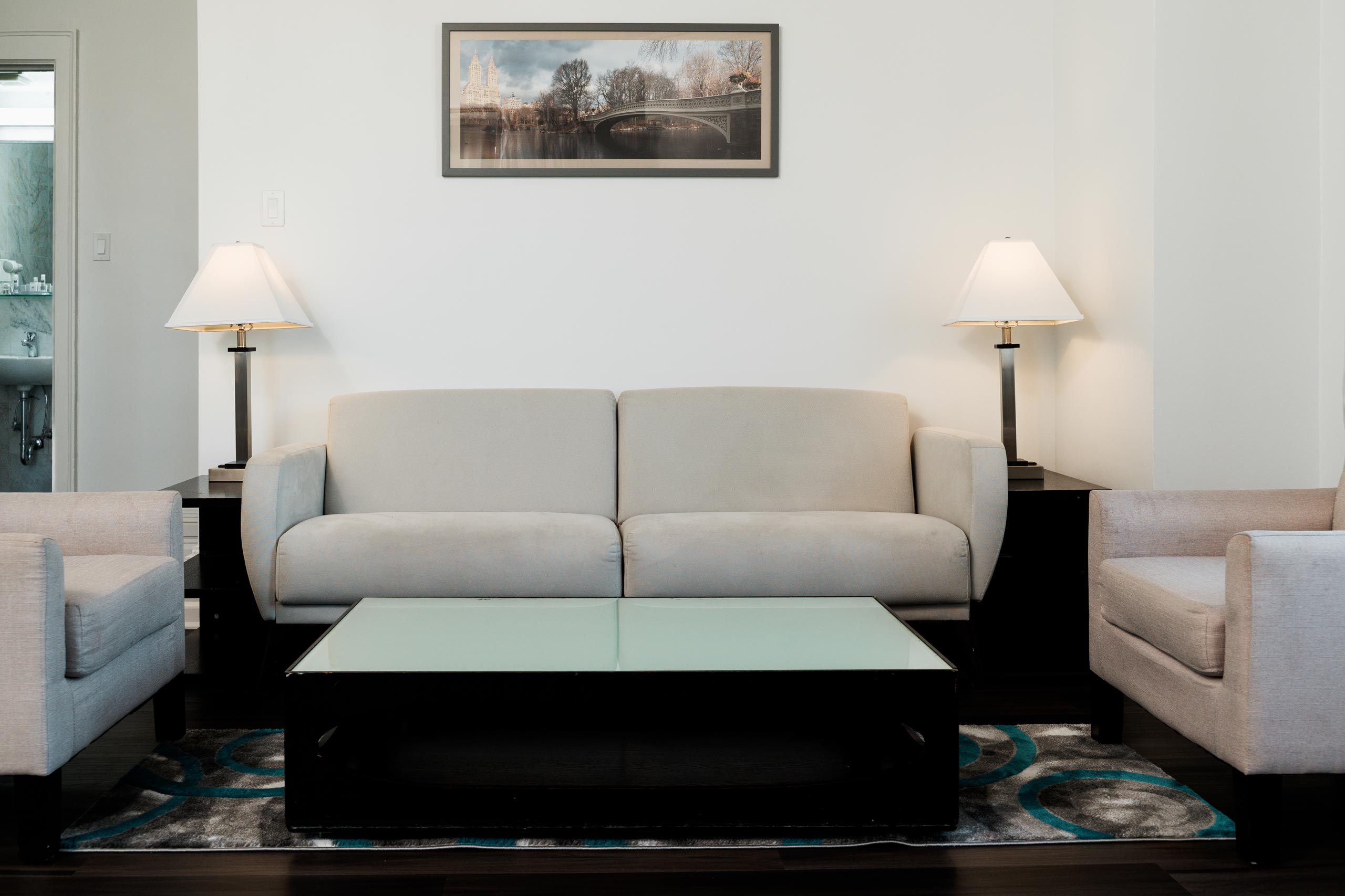 White sofa with two lamps